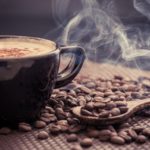 coffee-beans-and-steaming-cup